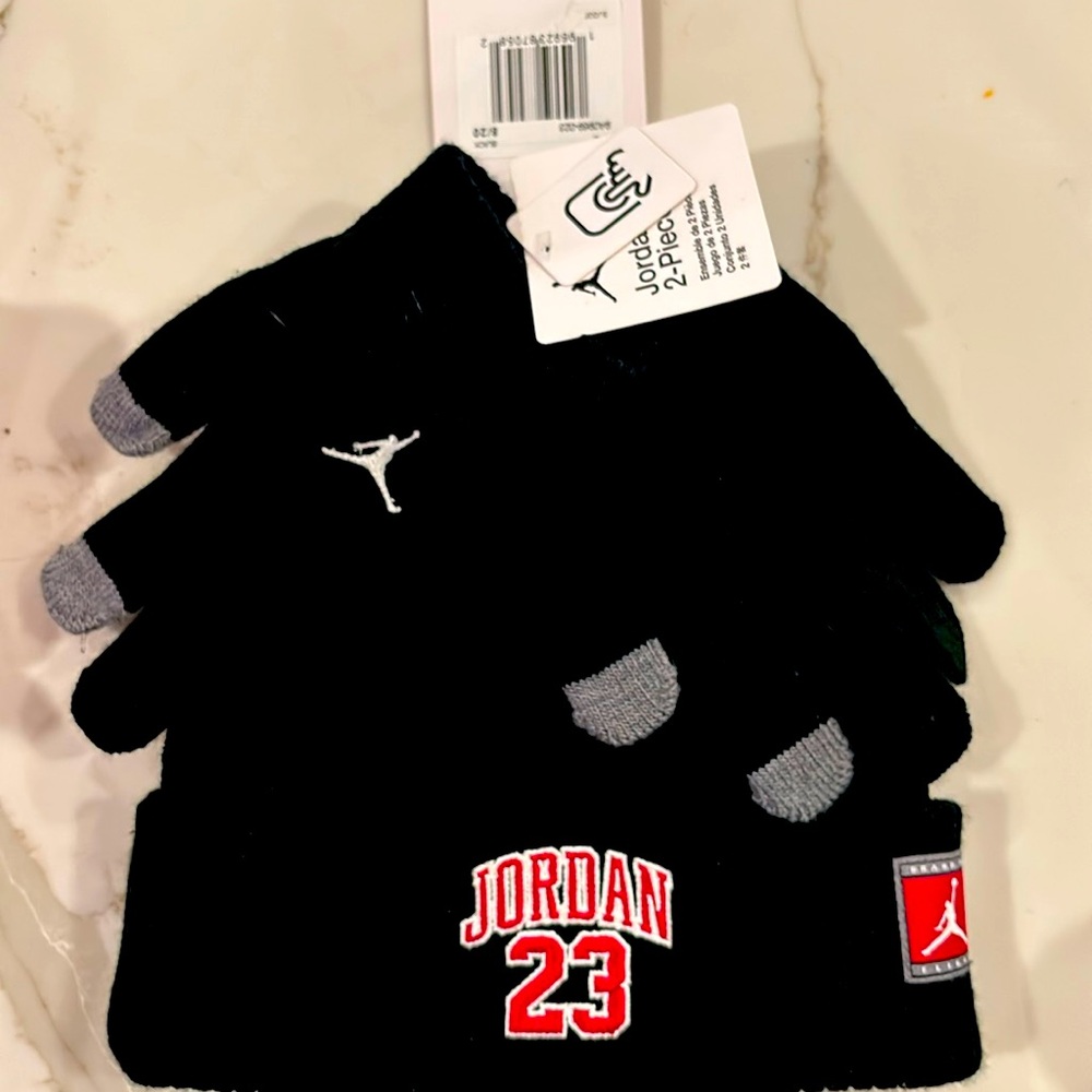 New with tabs Jordan 2-piece kids gloves and beanie.